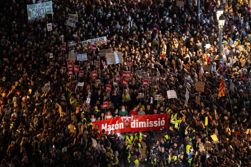 Tens of thousands march to demand Valencia leader resign over handling of deadly floods 